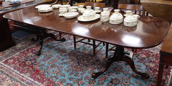 A Georgian style mahogany two-pillar extending dining table by William Tillman Ltd 270cm extended (two spare leaves)